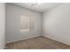 Neutral bedroom with blinds, ceiling fan and carpeted floor at 625 N Hamilton St # 36, Chandler, AZ 85225
