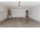 Spacious garage with concrete floor, white walls, and water heater at 625 N Hamilton St # 36, Chandler, AZ 85225