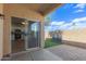 Covered patio with brick floor, and artificial grass area at 625 N Hamilton St # 36, Chandler, AZ 85225