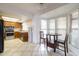 Bright kitchen with stainless steel appliances, ample cabinet space, and breakfast nook at 6409 W Riviera Dr, Glendale, AZ 85304