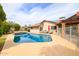 Sparkling pool with spacious patio, perfect for outdoor entertaining and relaxation at 6409 W Riviera Dr, Glendale, AZ 85304