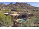 Stunning home features backyard pool and spa with mountain views at 7603 E Soaring Eagle Way, Scottsdale, AZ 85266