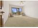 Spacious bedroom with a sliding glass door leading to the outdoors at 7603 E Soaring Eagle Way, Scottsdale, AZ 85266