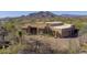 Lovely stucco home with desert landscaping and mountain views at 7603 E Soaring Eagle Way, Scottsdale, AZ 85266