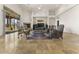 Open-concept living room with decorative fireplace at 7603 E Soaring Eagle Way, Scottsdale, AZ 85266
