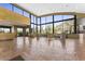 Spacious lobby features tile flooring, comfortable seating, and expansive windows with desert views at 7603 E Soaring Eagle Way, Scottsdale, AZ 85266