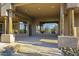 Spacious outdoor patio featuring stone accents and a concrete seating area perfect for entertaining at 7603 E Soaring Eagle Way, Scottsdale, AZ 85266