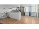 Open kitchen with stainless steel appliances and tile flooring creates an inviting space at 7605 W Avalon Dr, Phoenix, AZ 85033