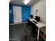 Bright computer room with patterned rug, two workstations, perfect for focusing at 7860 E Camelback Rd # 309, Scottsdale, AZ 85251