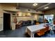 Bright craft room featuring worktables, ample storage, and natural light, perfect for hobbies at 7860 E Camelback Rd # 309, Scottsdale, AZ 85251