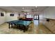 Inviting game room with a ping pong table and multiple pool tables at 7860 E Camelback Rd # 309, Scottsdale, AZ 85251