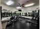 Bright gym featuring a variety of exercise equipment and mirrors at 7860 E Camelback Rd # 309, Scottsdale, AZ 85251