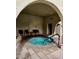 Relaxing hot tub area with lounge chairs, accented by arched architectural design elements at 7860 E Camelback Rd # 309, Scottsdale, AZ 85251