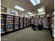 Library featuring bookshelves, a seating area, and natural light at 7860 E Camelback Rd # 309, Scottsdale, AZ 85251
