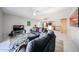 Bright living room featuring modern furniture and an open layout to the kitchen at 7860 E Camelback Rd # 309, Scottsdale, AZ 85251