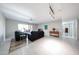 Inviting living room with stylish furniture, ceiling fan, and patio access at 7860 E Camelback Rd # 309, Scottsdale, AZ 85251