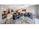 Spacious living room with contemporary furniture, seamlessly connecting to the kitchen at 7860 E Camelback Rd # 309, Scottsdale, AZ 85251