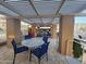 Poolside patio area with comfortable seating and lush landscaping, perfect for relaxation at 7860 E Camelback Rd # 309, Scottsdale, AZ 85251