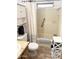 Bright bathroom featuring a shower and tub with shower curtain and storage at 805 S 82Nd Pl, Mesa, AZ 85208