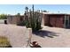 Charming home featuring desert landscaping with a large cactus and gravel yard for easy maintenance at 805 S 82Nd Pl, Mesa, AZ 85208