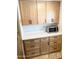 Mud room features bright cabinets, drawers, modern hardware, and a countertop at 805 S 82Nd Pl, Mesa, AZ 85208