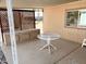 The patio features a table and exterior lattice providing a functional spot at 805 S 82Nd Pl, Mesa, AZ 85208