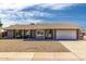 Charming single-story home featuring a well-maintained landscape and attached two car garage at 8837 W Coolidge St, Phoenix, AZ 85037