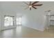 Light and airy living room with tile floors, neutral walls and large window at 8837 W Coolidge St, Phoenix, AZ 85037