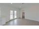 Brightly lit room with double French doors, tile flooring and lots of space at 8837 W Coolidge St, Phoenix, AZ 85037