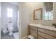 Well-kept bathroom featuring a single sink vanity, tile floors, and a separate toilet and shower area at 9096 E Mountain Spring Rd, Scottsdale, AZ 85255