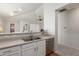 Modern kitchen featuring stainless steel appliances, white cabinetry, and ample counter space for cooking and preparation at 9233 E Neville Ave # 1138, Mesa, AZ 85209