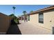 Cozy backyard with a covered patio and gravel landscaping at 9763 W Butler Dr, Peoria, AZ 85345
