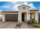 Charming single-Gathering home with a well-maintained lawn, beautiful tile roof, and inviting curb appeal at 10657 E Texas Ave, Mesa, AZ 85212