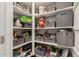 Organized pantry features shelving and storage containers for optimal kitchen storage and convenience at 10657 E Texas Ave, Mesa, AZ 85212