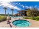 Community pool area with a spa and lift, and a view of the recreation center at 10657 E Texas Ave, Mesa, AZ 85212