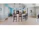 Open-concept kitchen featuring a breakfast bar, granite countertops and a dining area at 10718 E Secret Canyon Rd, Gold Canyon, AZ 85118