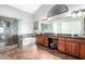 Primary bathroom features double vanity, large mirror, soaking tub, and glass-enclosed shower at 1344 W Seascape Dr, Gilbert, AZ 85233