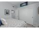Bright bedroom with patterned bedding, closet, and artwork create a serene space at 14741 E Mountain Majesty --, Fountain Hills, AZ 85268
