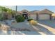 Charming single-story home featuring desert landscaping and a three-car garage, providing ample parking space at 14741 E Mountain Majesty --, Fountain Hills, AZ 85268