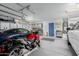 Spacious garage with epoxy floors, cabinets, and multiple vehicles, ideal storage at 14741 E Mountain Majesty --, Fountain Hills, AZ 85268
