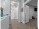 Open hallway with tile flooring, arched doorways, and neutral paint, great flow throughout home at 14741 E Mountain Majesty --, Fountain Hills, AZ 85268