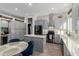 Spacious kitchen with gray cabinets, a stainless steel refrigerator, and a stylish breakfast area with seating at 14741 E Mountain Majesty --, Fountain Hills, AZ 85268
