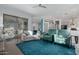 Bright living room with an open floor plan, stylish decor, and a sliding glass door to the outdoor patio at 14741 E Mountain Majesty --, Fountain Hills, AZ 85268