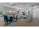 Spacious living area featuring tile floors, multiple windows, and comfortable seating arrangements at 14741 E Mountain Majesty --, Fountain Hills, AZ 85268