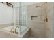 This bathroom includes tile floors, and a soaking tub with a glass block window at 14741 E Mountain Majesty --, Fountain Hills, AZ 85268