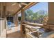 Covered outdoor kitchen featuring a sink, grill, and bar area at 14741 E Mountain Majesty --, Fountain Hills, AZ 85268
