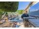 Outdoor kitchen with a built-in grill and sparkling pool at 14741 E Mountain Majesty --, Fountain Hills, AZ 85268