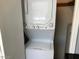 Convenient laundry area features a stacked washer and dryer for efficient space-saving at 15402 N 28Th St # 112, Phoenix, AZ 85032