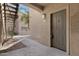 Up-close exterior featuring the front door, stairs, and desert landscaping at 16013 S Desert Foothills Pkwy # 1133, Phoenix, AZ 85048