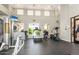 Community gym with modern exercise equipment, fans, and an abundance of natural light at 16013 S Desert Foothills Pkwy # 1133, Phoenix, AZ 85048